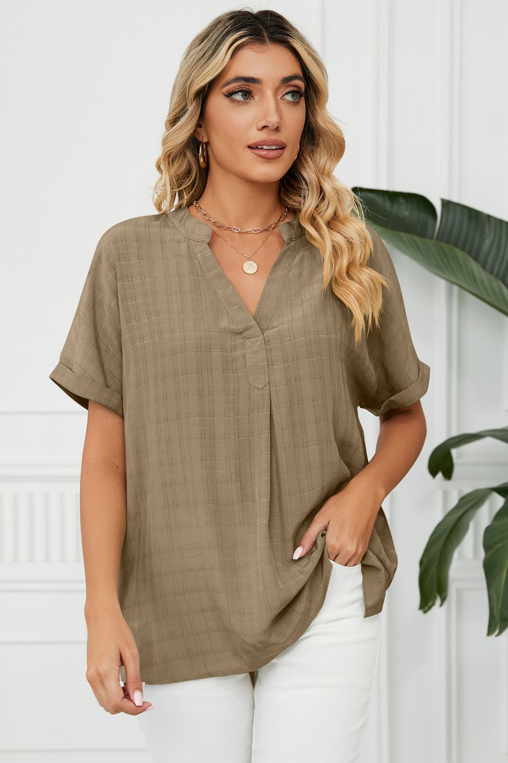 Notched neck cuffed short sleeve blouse with side slits