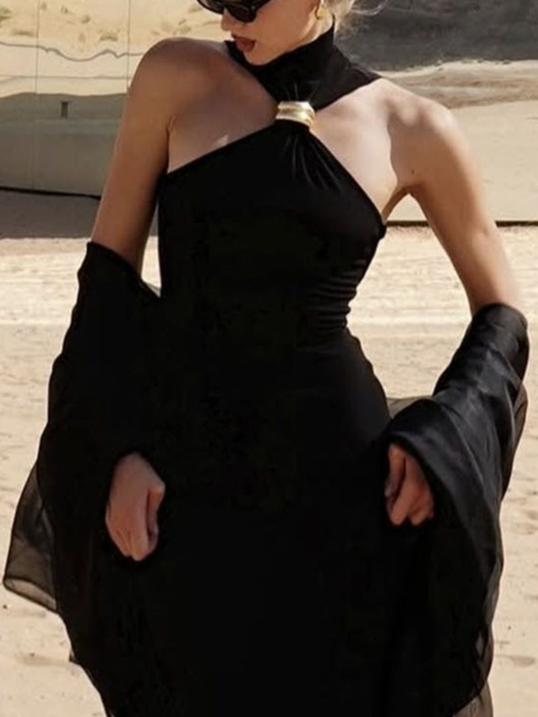 Sleeveless turtleneck tank with gold ring cutout detail