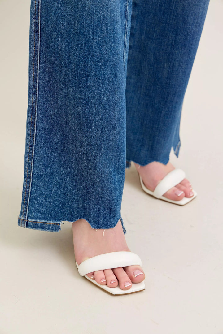 High-rise tummy control wide leg jeans with raw chewed hem