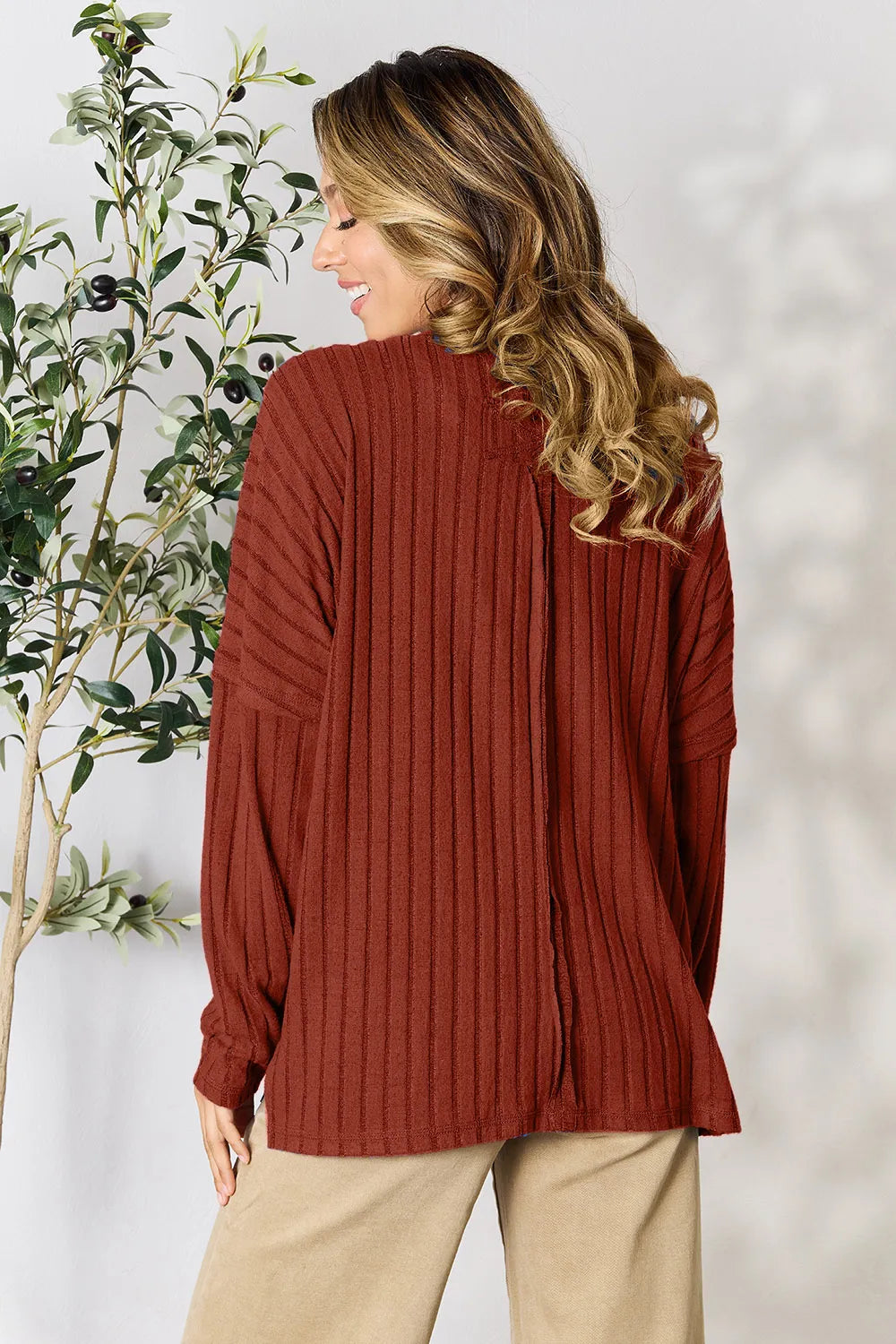 Ribbed knit round neck tunic top with side slits