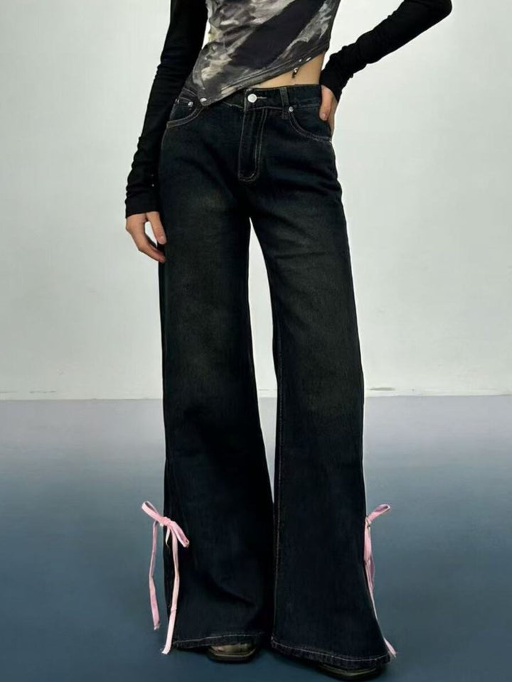 Low-rise flare jeans with ribbon bow leg slits