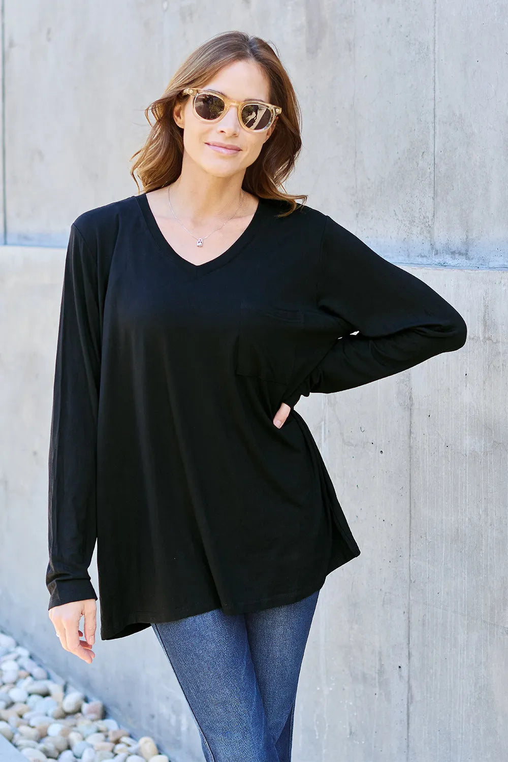 Black V-neck long sleeve top with chest pocket