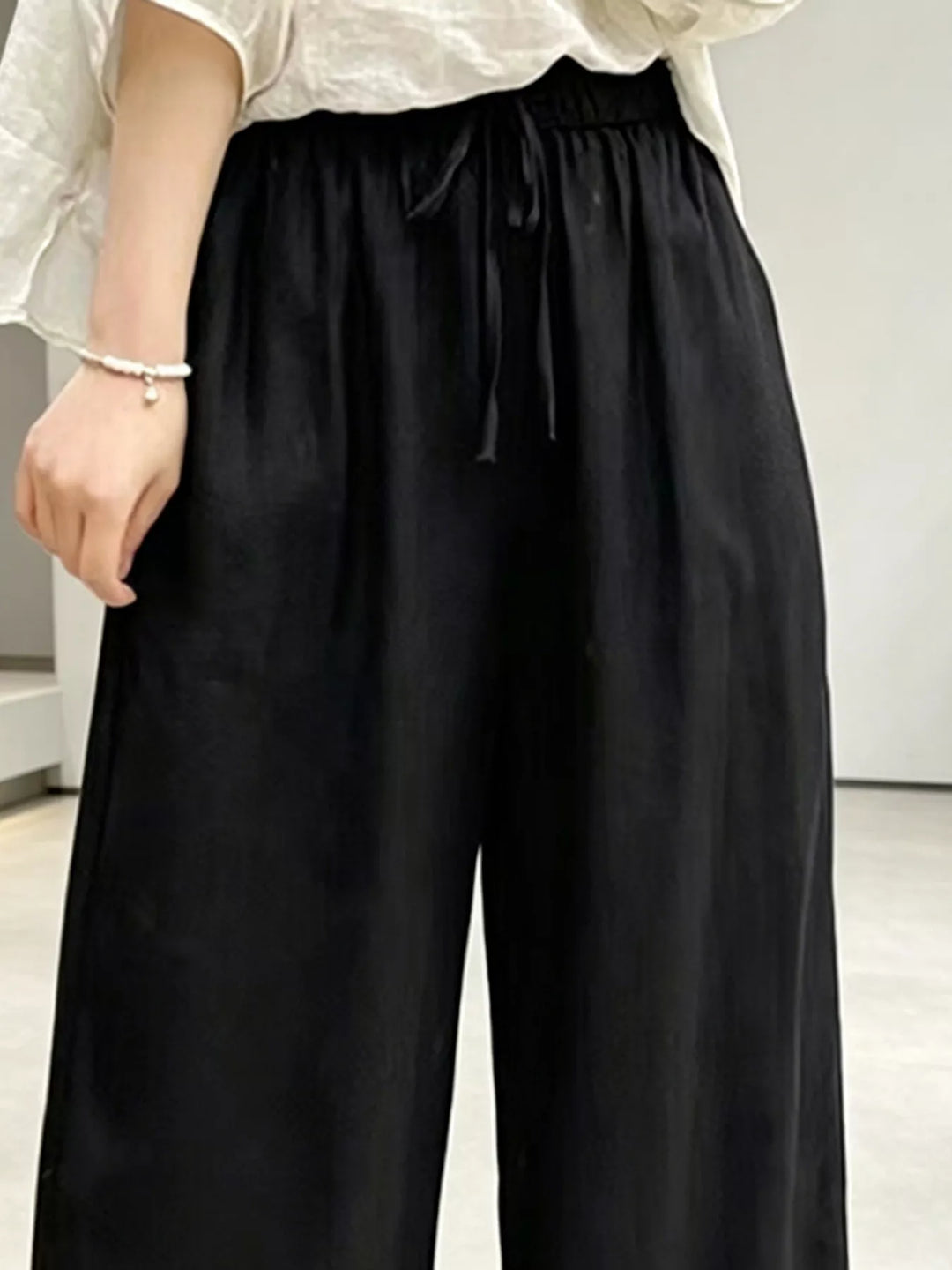 Wide leg drawstring pants with side pockets
