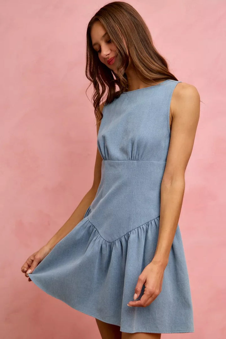 Sleeveless boat neck denim mini dress with flounce hem