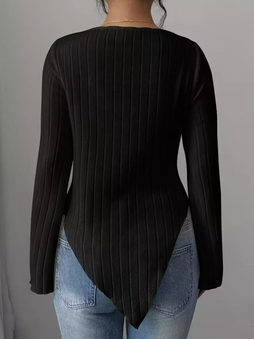 Ribbed knit cowl neck top with asymmetric hem and flared sleeves