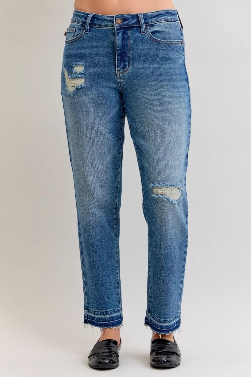 Distressed mid-rise boyfriend jeans with released raw hem