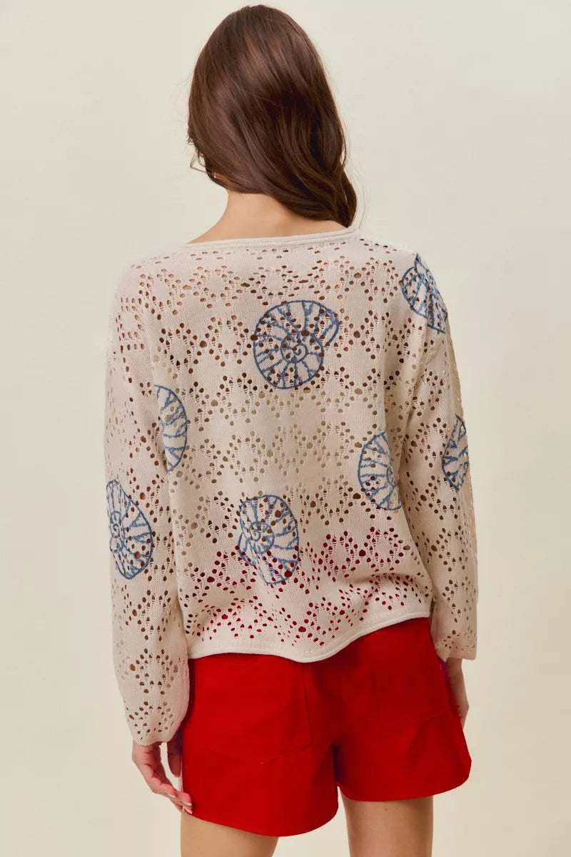 Seashell motif openwork knit long sleeve top