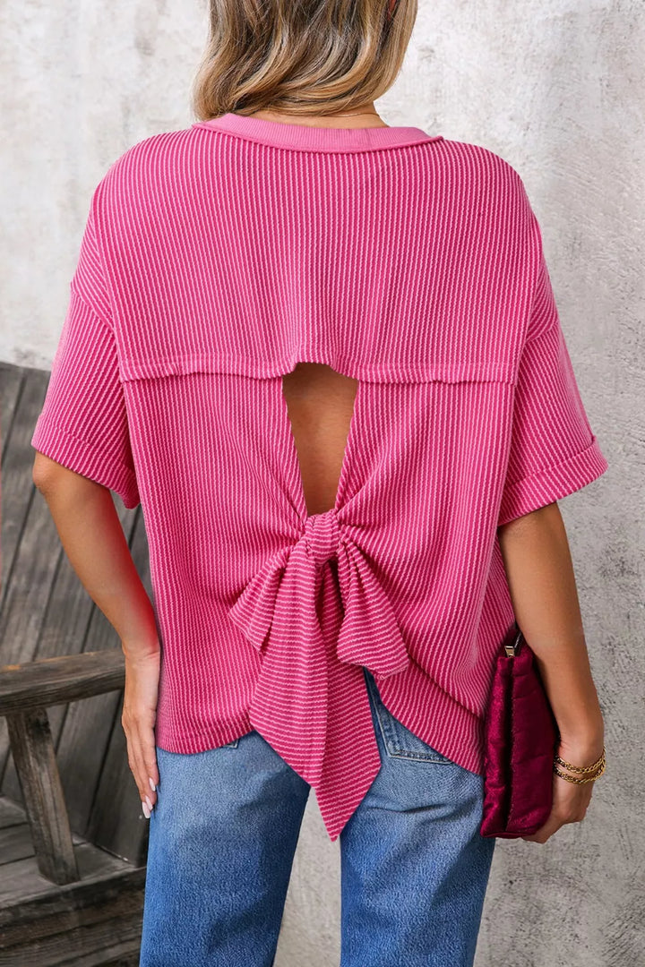 Deep Rose Ribbed knit short sleeve top with cutout bow-tie back