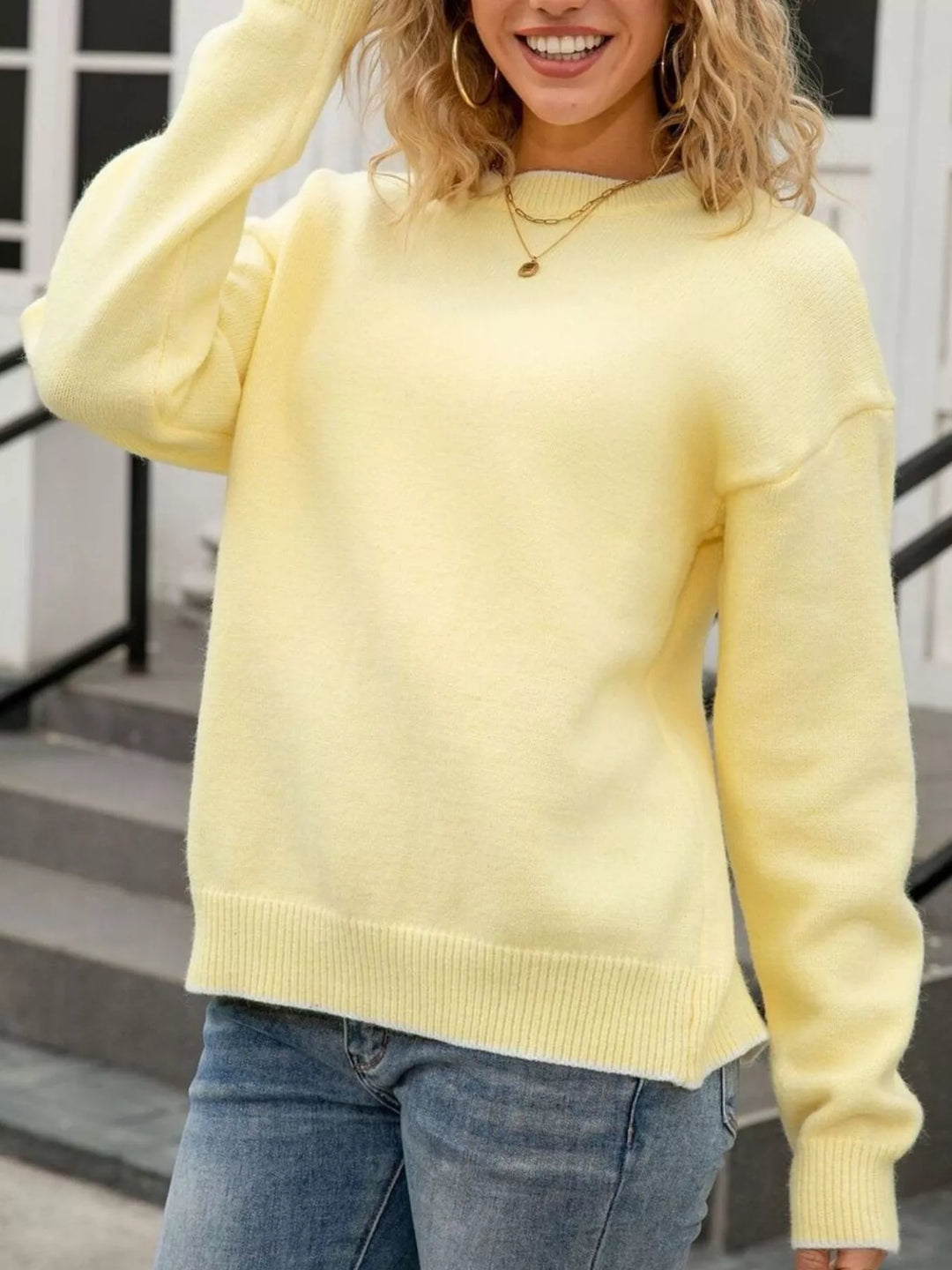 Bow-back knit sweater with ribbon ties and round neck