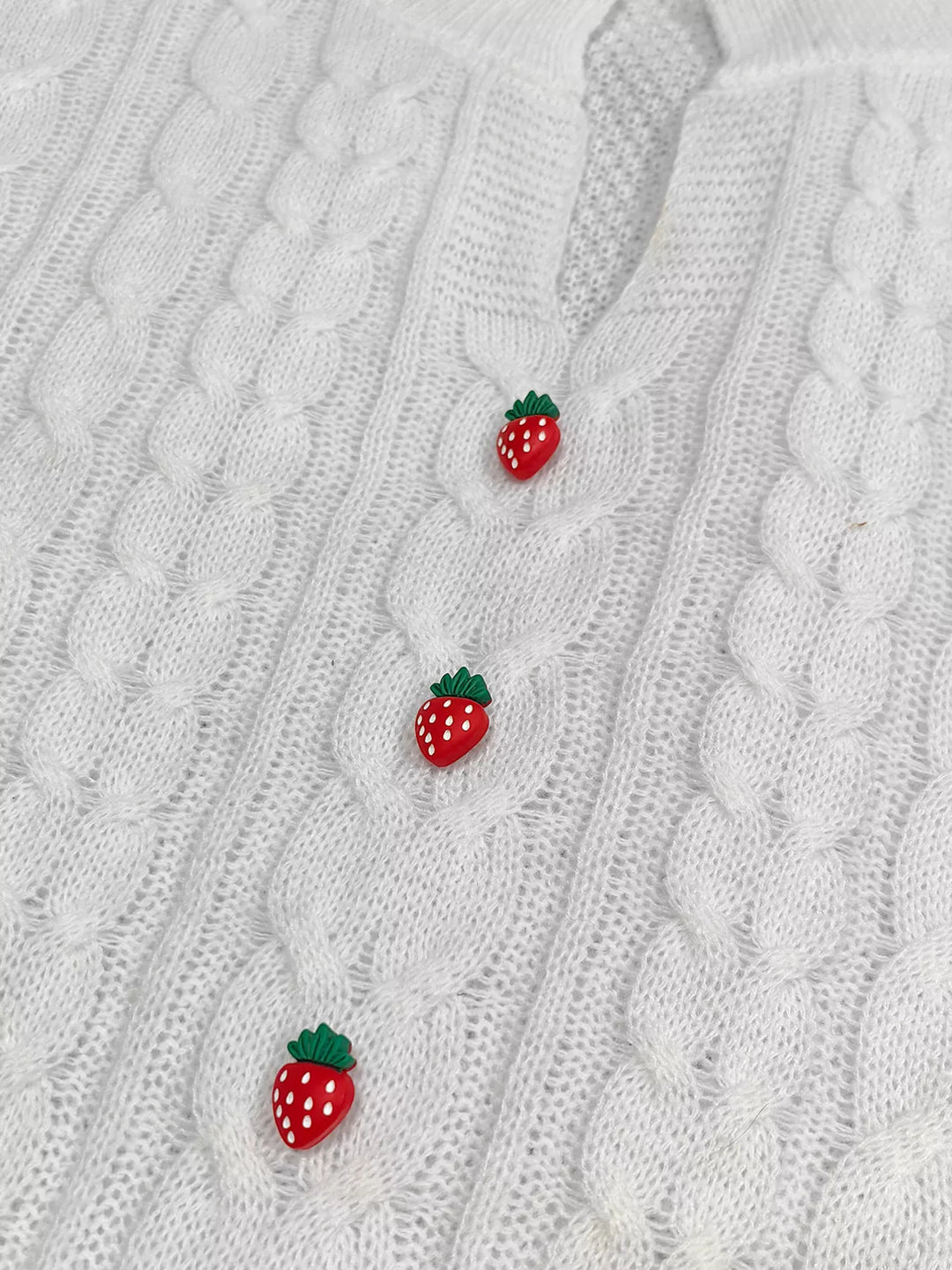 Cable knit sweater dress with strawberry buttons