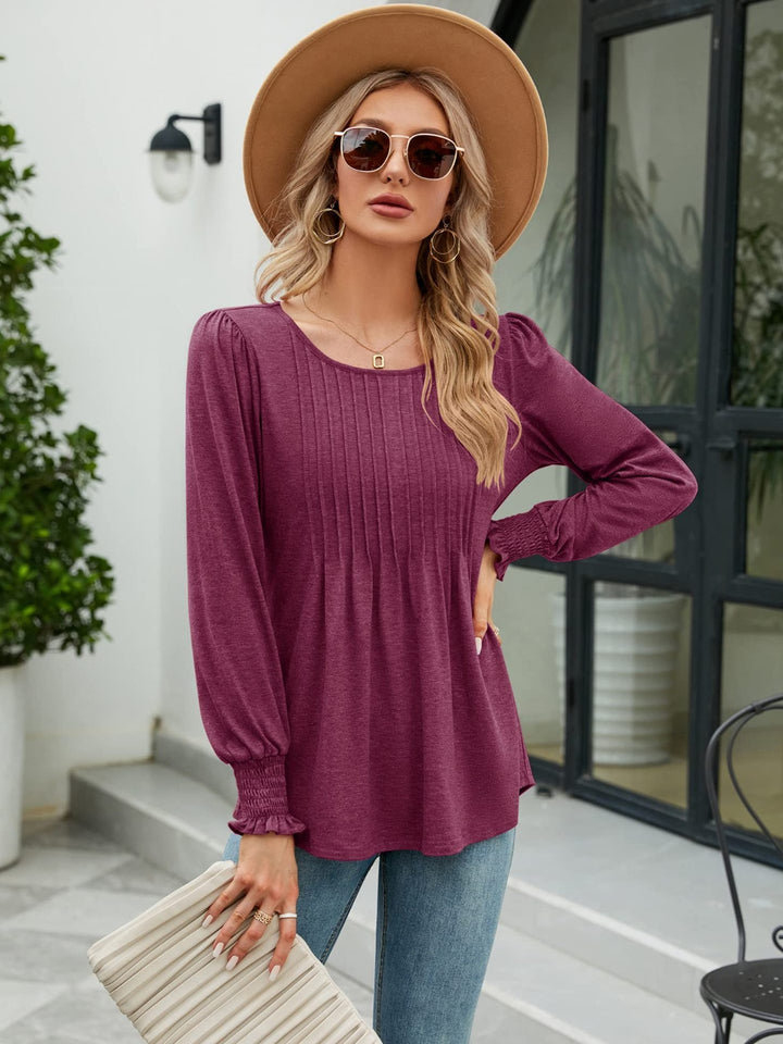 Cerise Pleated front lantern sleeve blouse with smocked cuffs