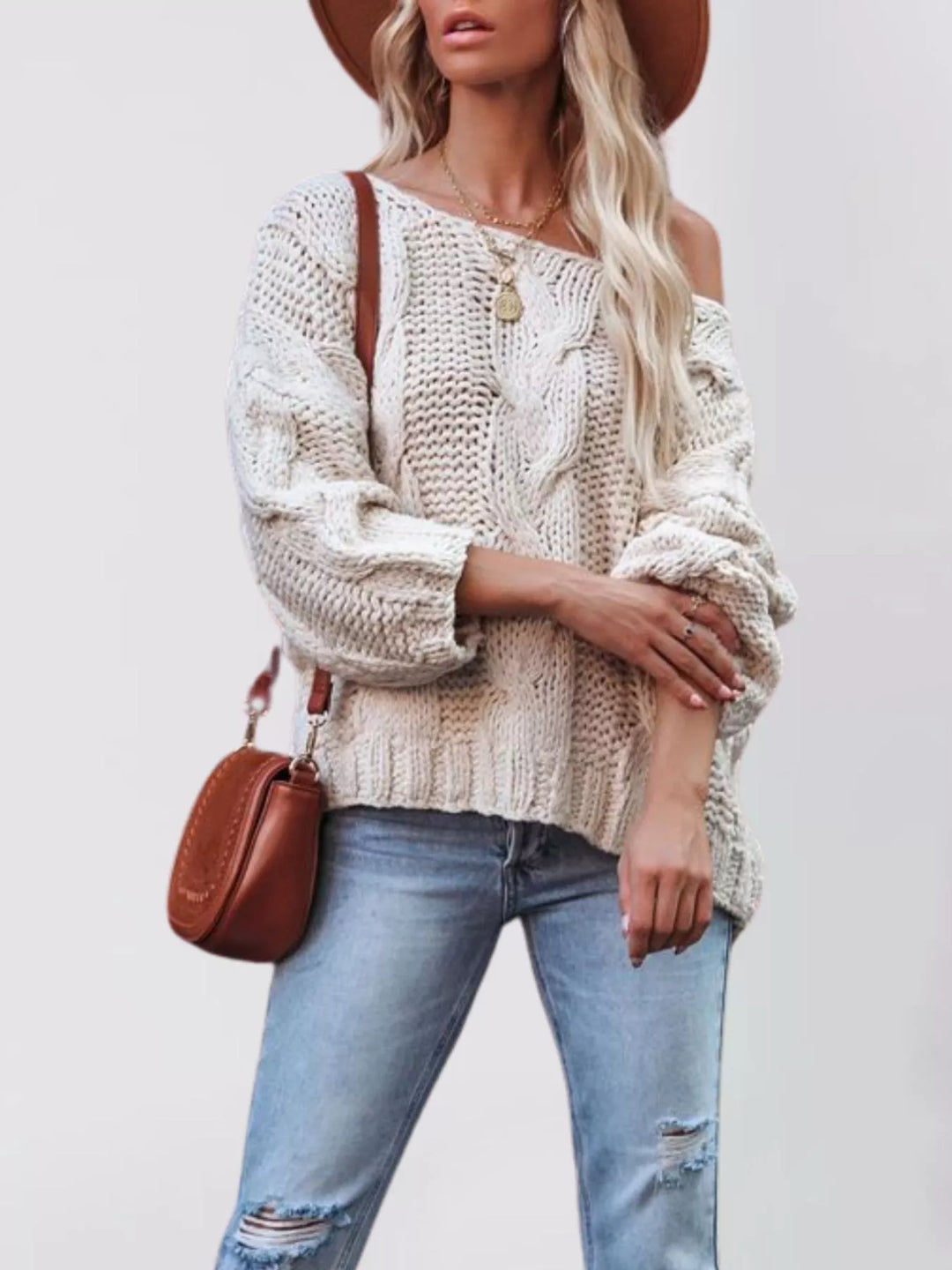 Oversized chunky cable knit pullover with wide boat neck