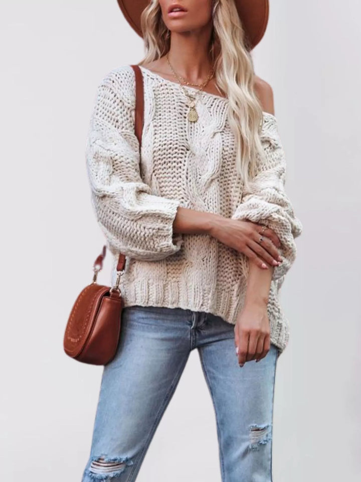 Oversized chunky cable knit pullover with wide boat neck