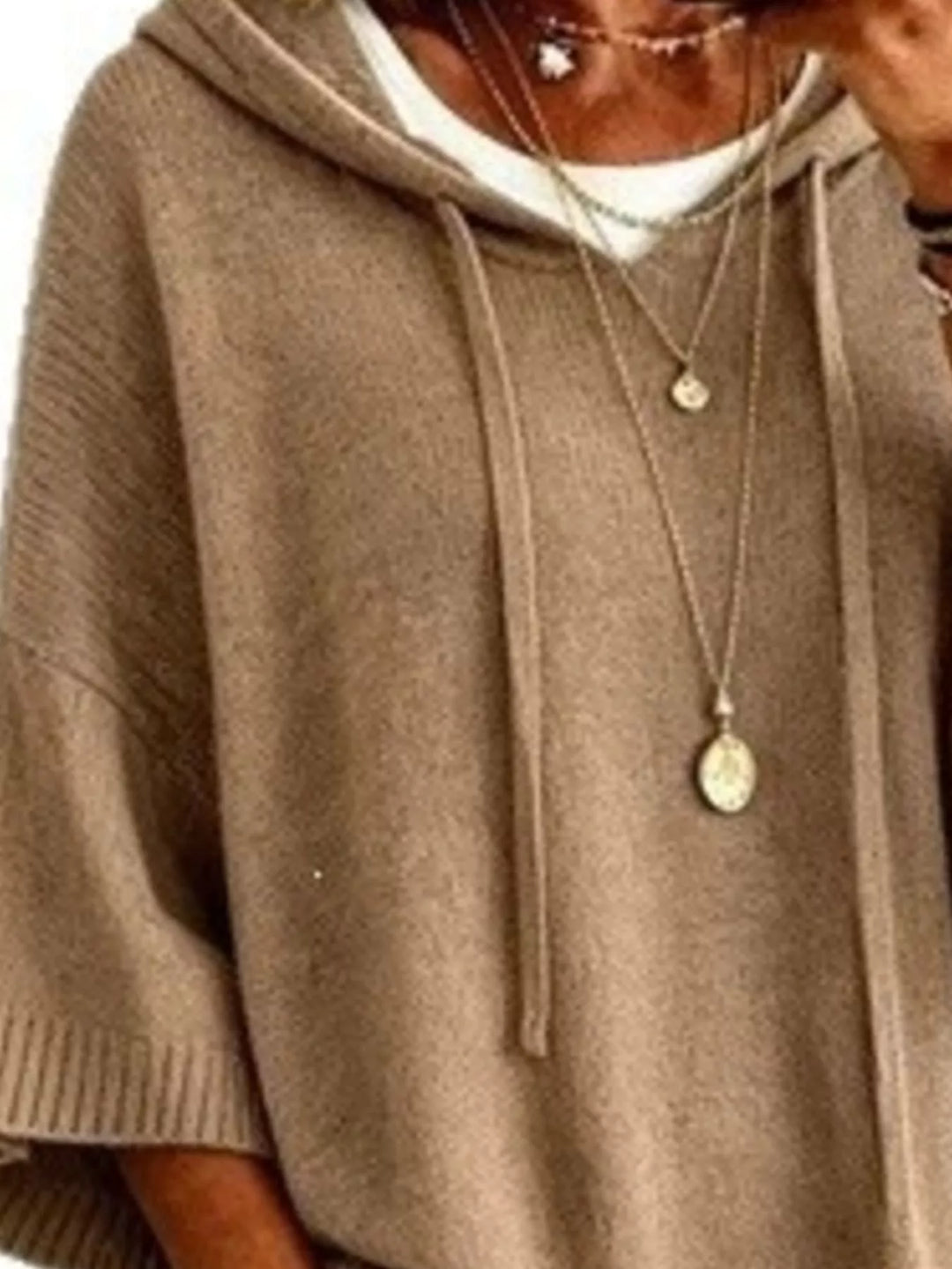 Oversized hooded sweater with drawstring and ribbed trim