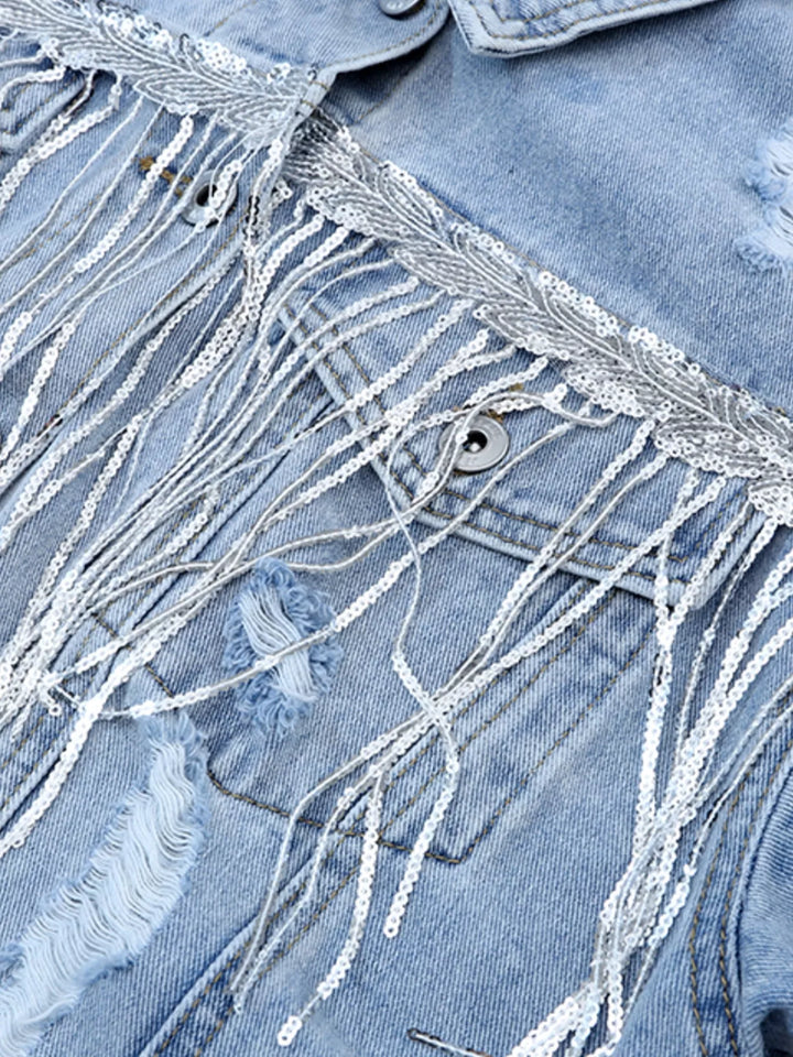 Distressed denim jacket with sequin fringe and chest pockets