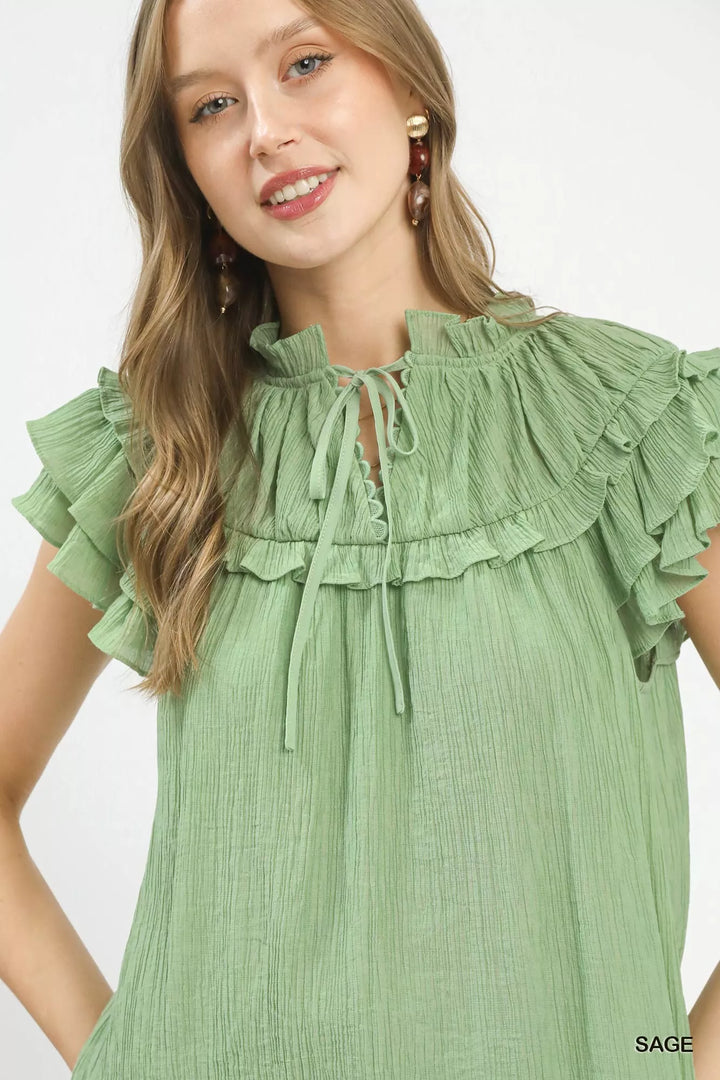 Tiered ruffle flutter sleeve tie-neck textured blouse
