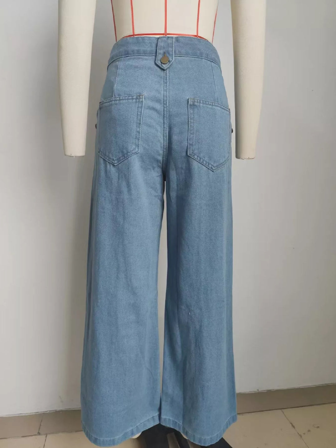 Sleeveless button-front denim vest and wide-leg pants set