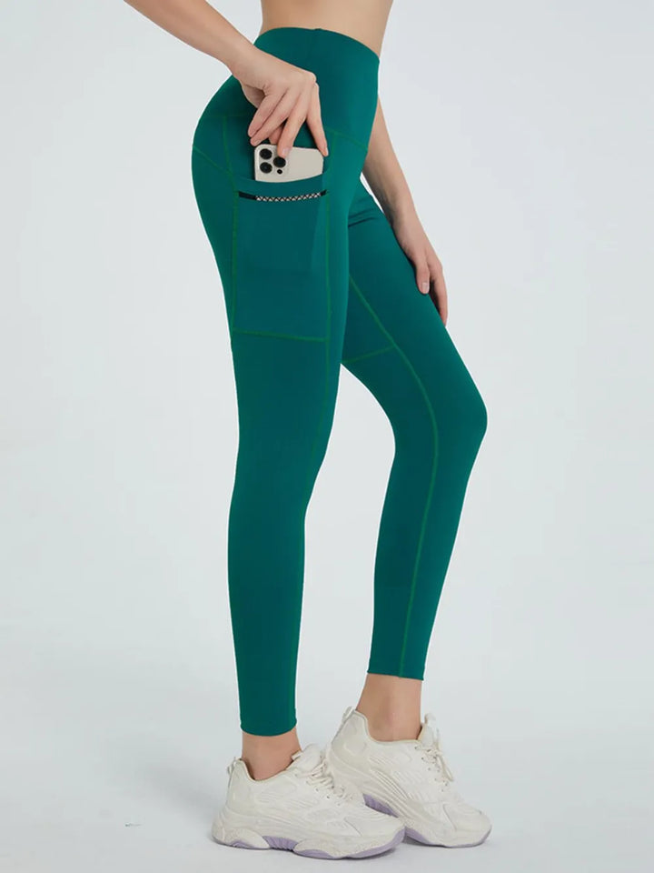 Dark Green High-waist active leggings with side phone pockets