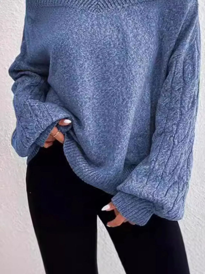 Cold-shoulder cable-knit turtleneck sweater