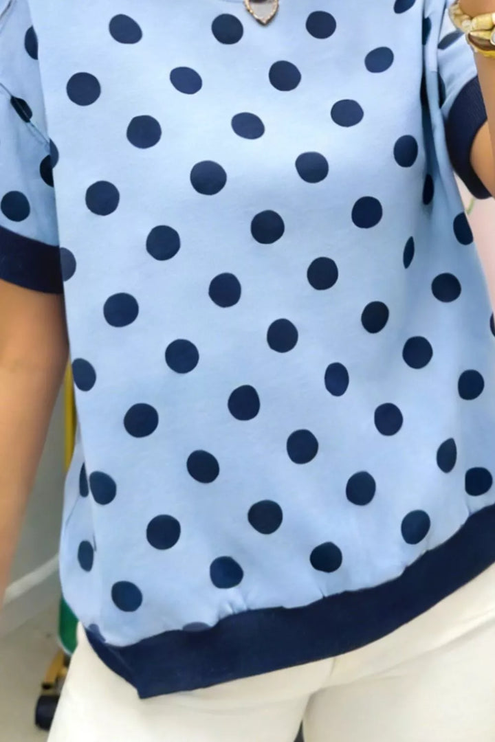 Polka dot short sleeve knit top with ribbed contrast trim
