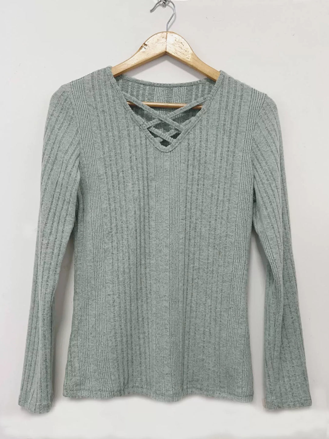 Crisscross V-neck ribbed knit long sleeve top