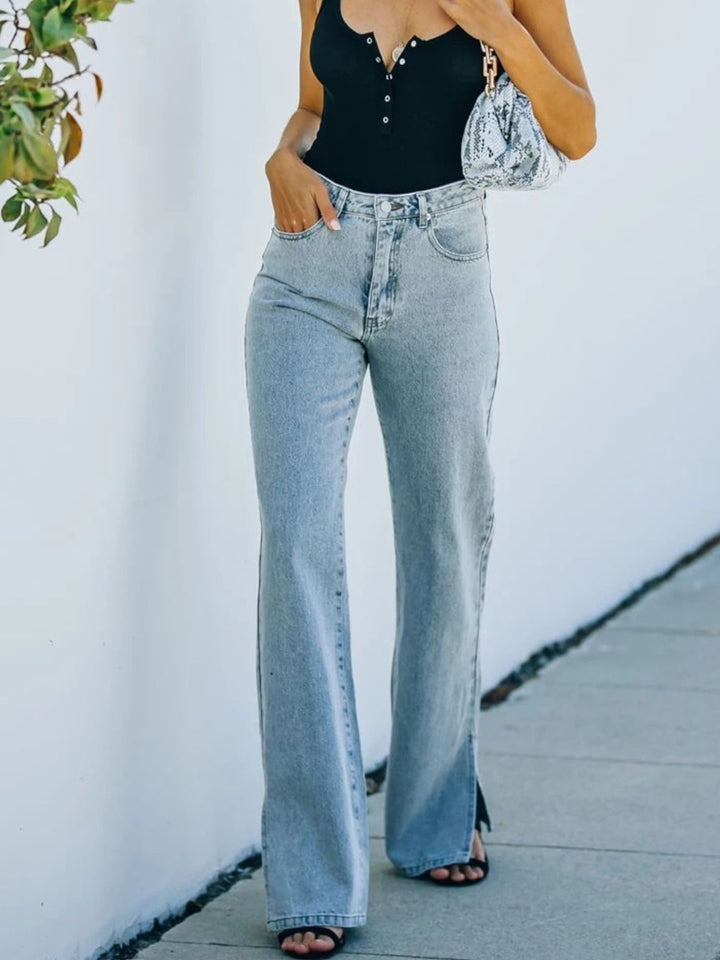 High-rise bootcut jeans with side slit hem