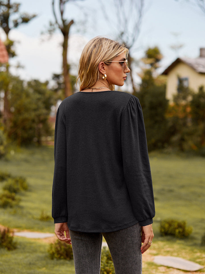 Ruffle trim puff sleeve split-neck blouse