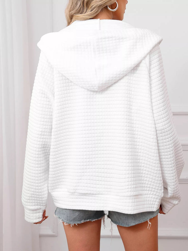 Textured quilted zip-up hooded jacket with pockets