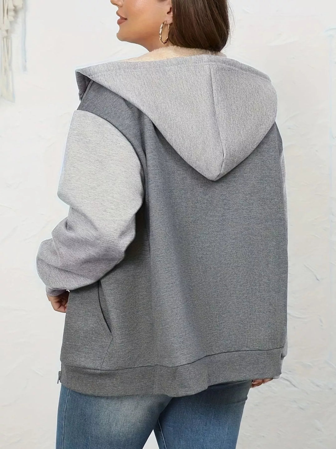 Sherpa-lined zip-up hoodie with colorblock sleeves
