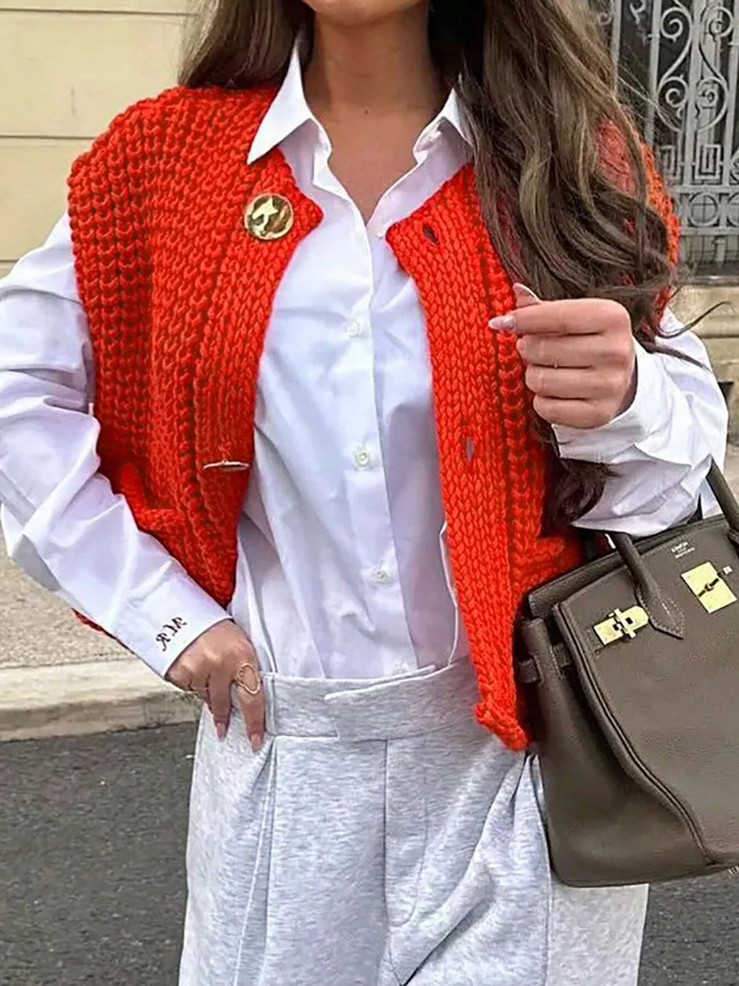 Chunky cable knit sweater vest with gold buttons