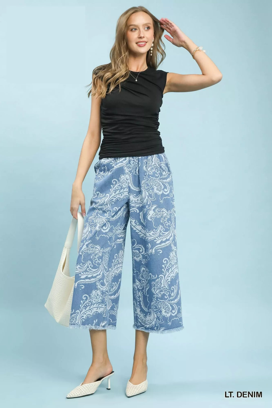 Stone wash floral wide leg crop pants with frayed hem