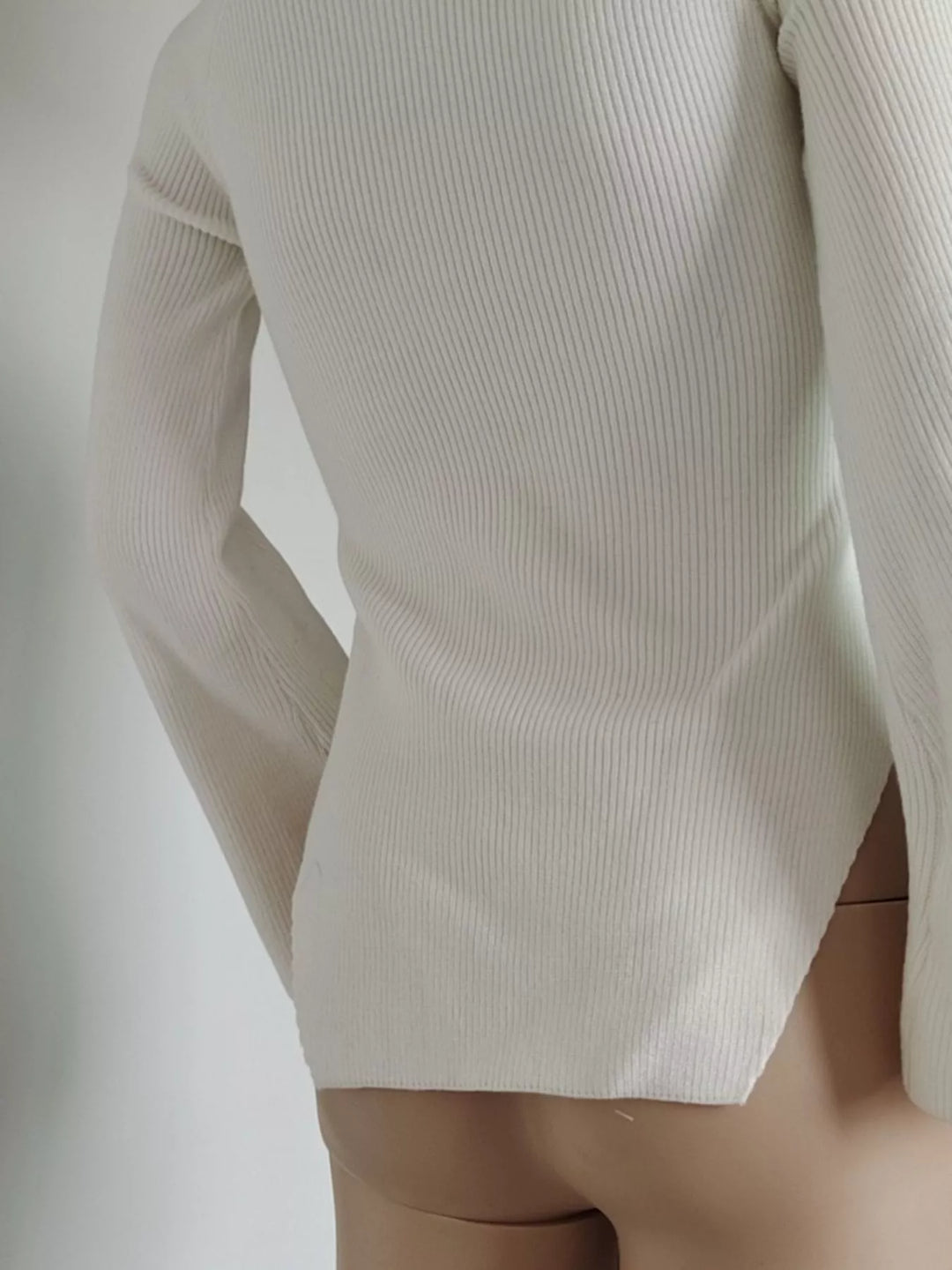 Ribbed knit sweetheart neckline sweater with slit hem