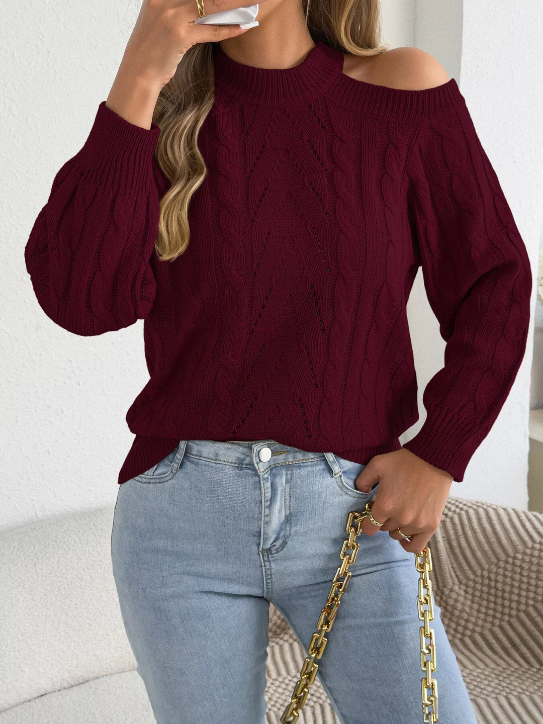Cold shoulder cable knit mock neck sweater