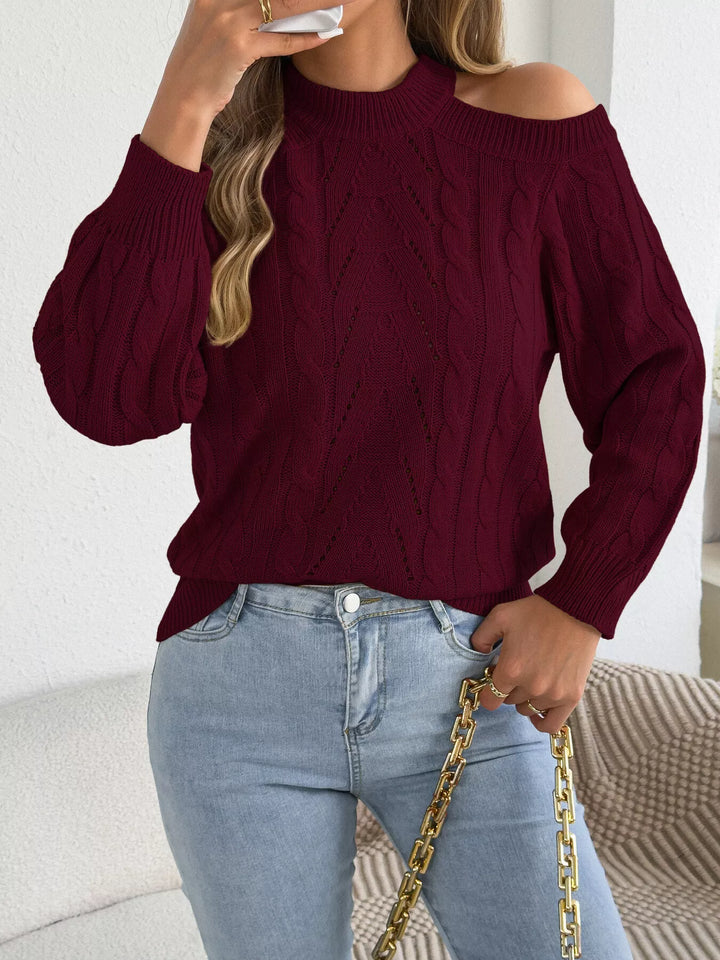 Cold shoulder cable knit mock neck sweater