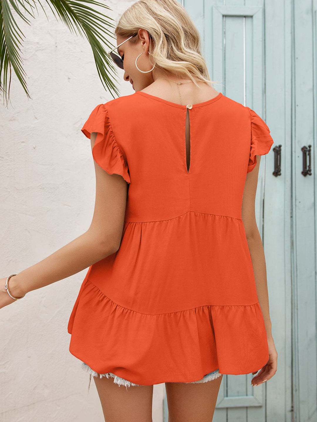 Flutter sleeve tiered babydoll blouse with round neck