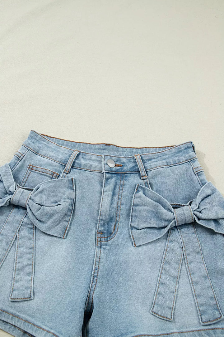 Mid-rise denim shorts with bow-tied front patch pockets