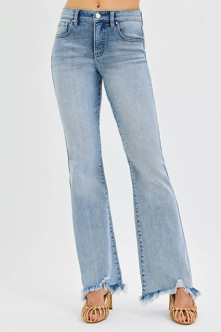 Mid-rise flare jeans with frayed raw hem and tummy control