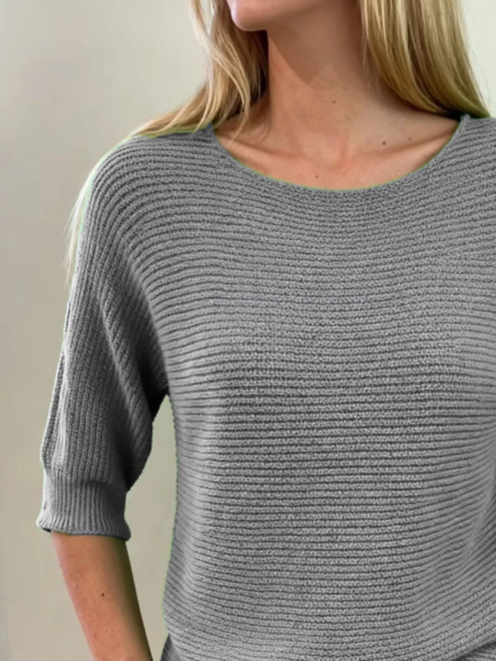 Ribbed knit round neck sweater with dolman sleeves