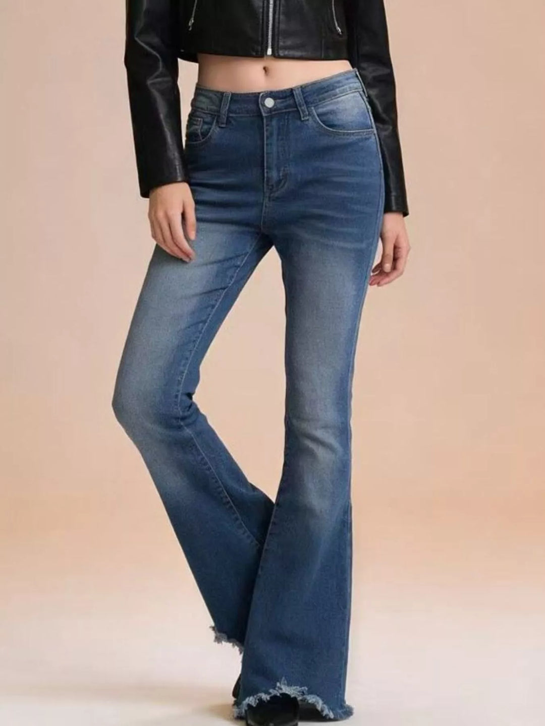 Raw hem high-rise flare jeans with whiskered wash