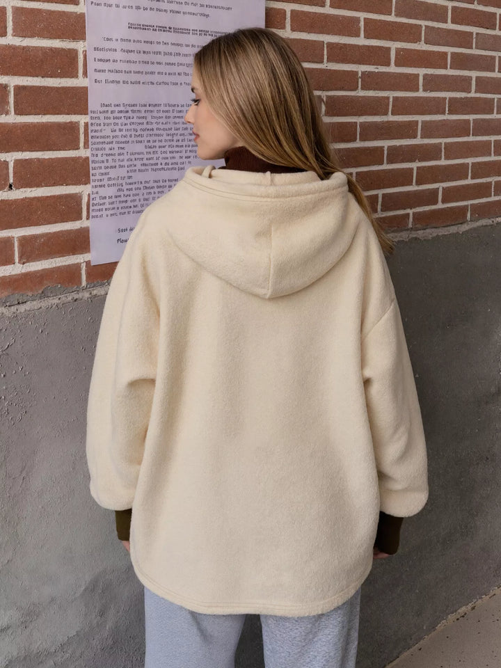 Oversized sherpa hoodie with kangaroo pocket and drawstring hood
