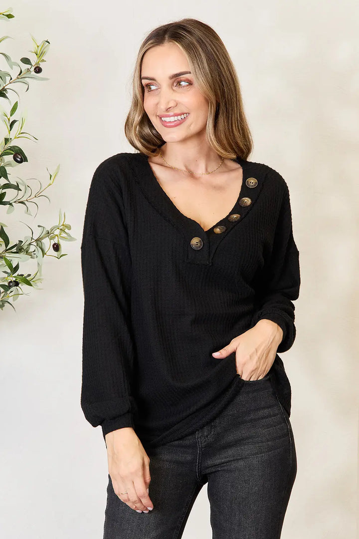 Waffle-knit henley blouse with V-neck and long sleeves