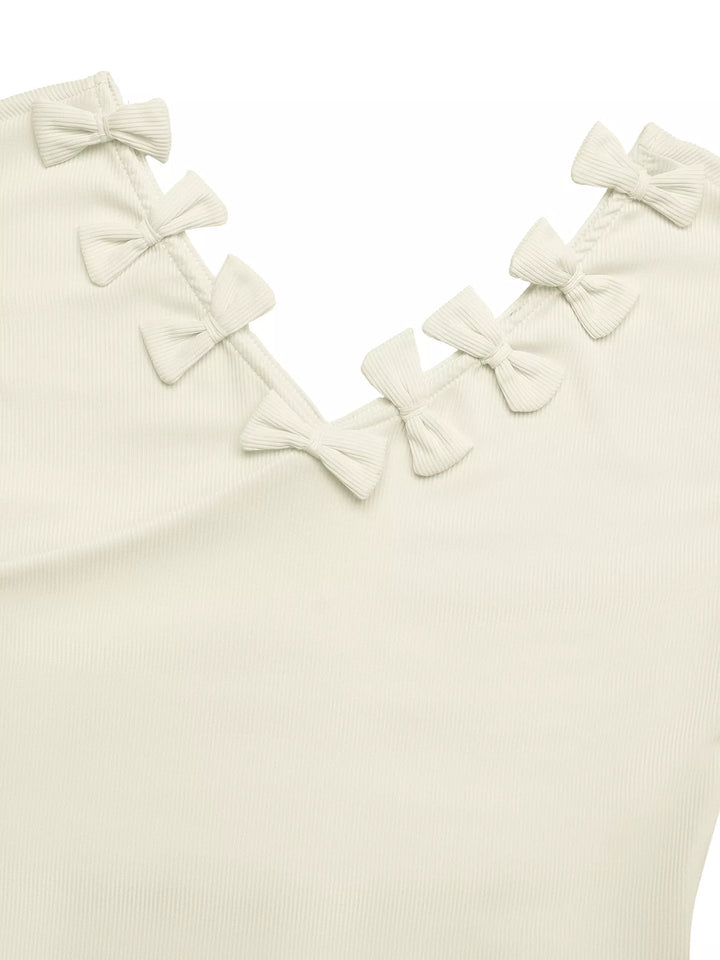 Ribbed knit cap sleeve V-neck top with bow trim