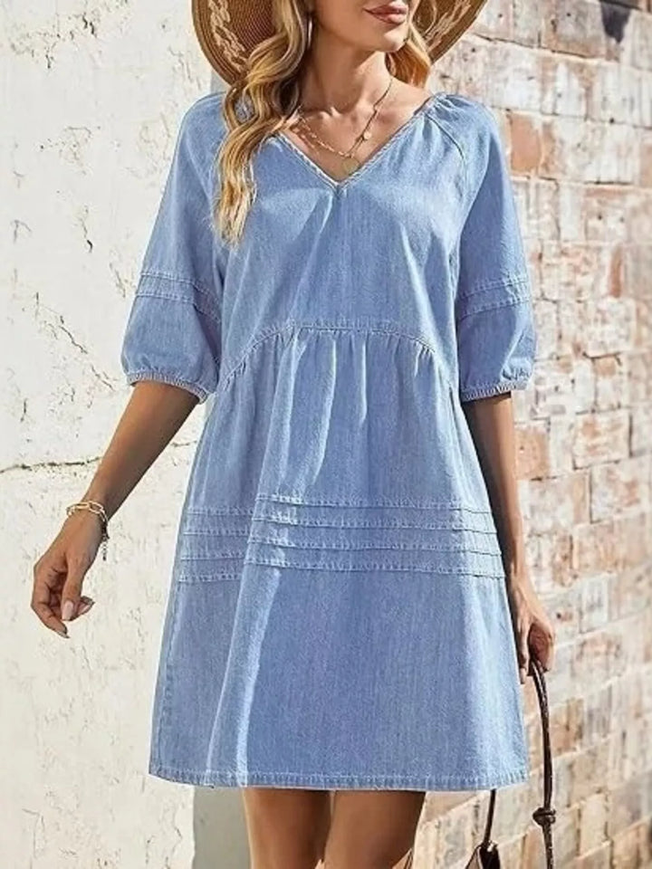 V-neck puff sleeve denim mini dress with pintuck pleating
