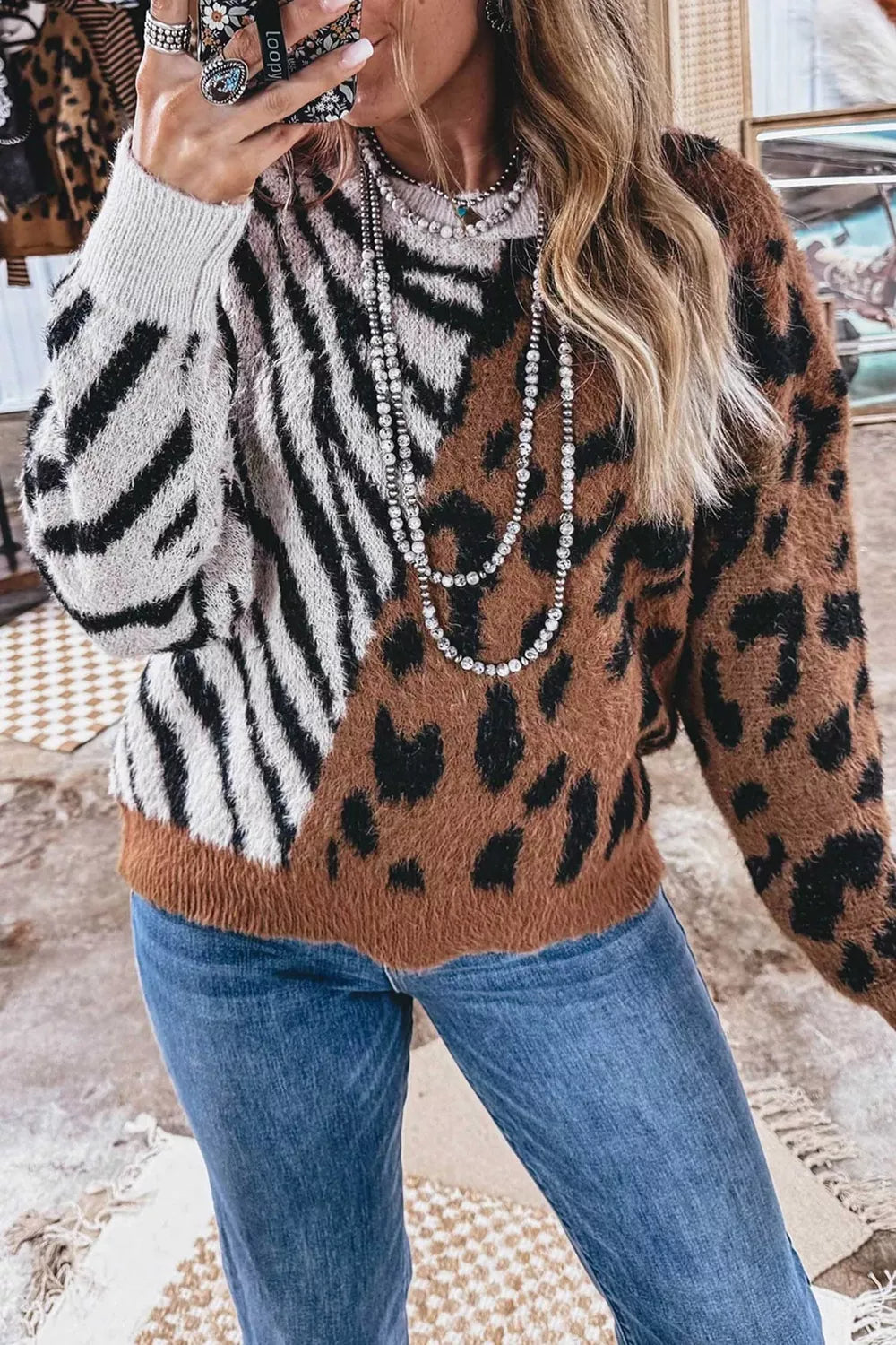 Leopard and zebra colorblock fuzzy knit crew neck sweater