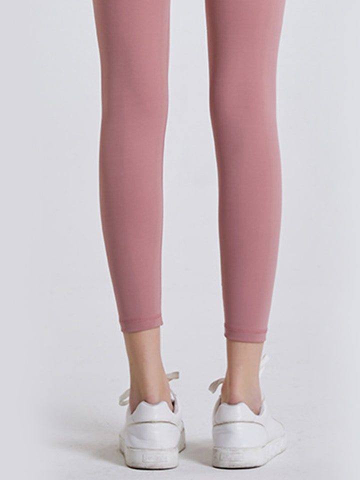 High-rise sports leggings with wide yoke waistband