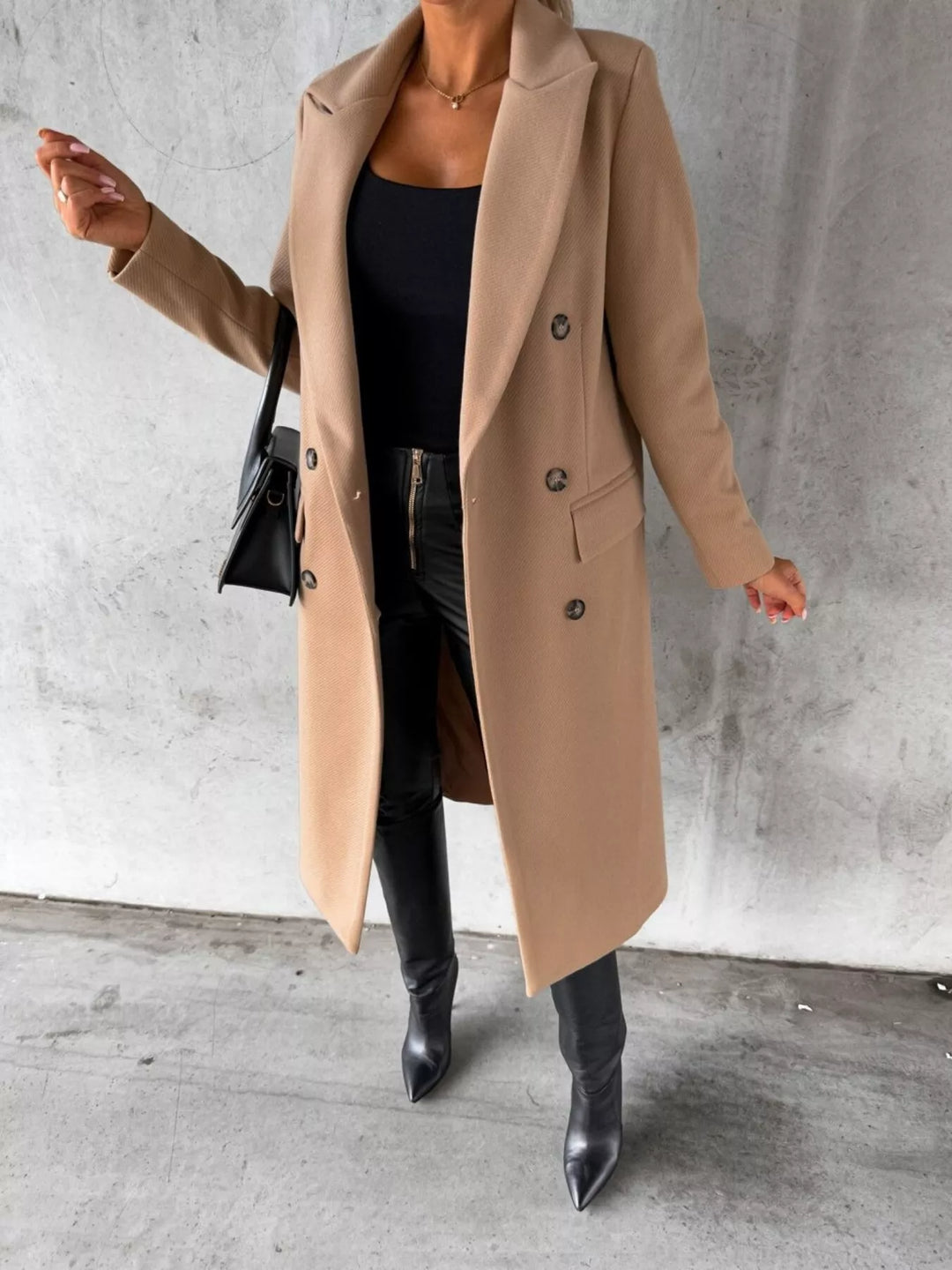 Double-breasted longline coat with notch lapel and flap pockets
