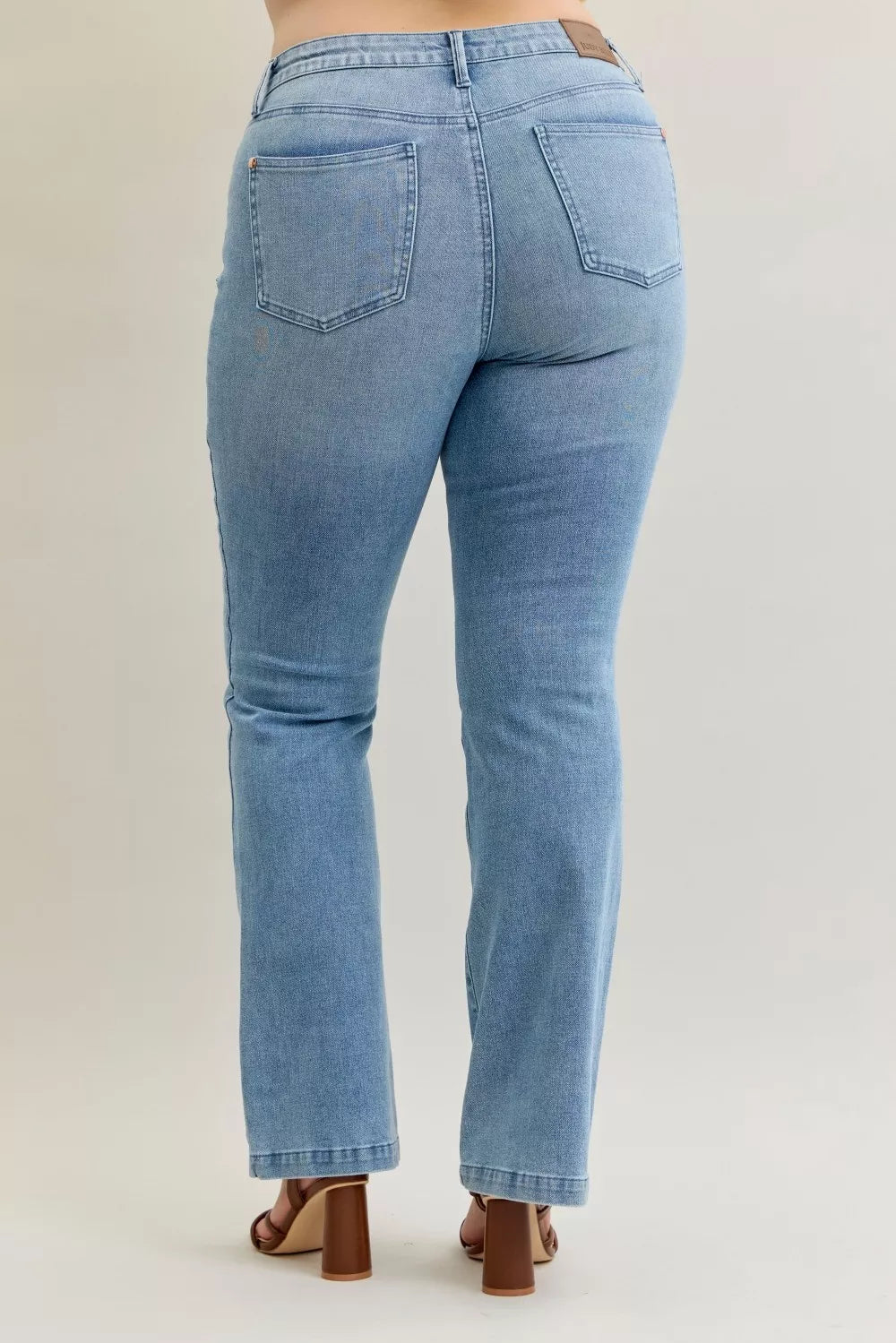 Mid-rise contrast wash bootcut jeans with front patch pockets