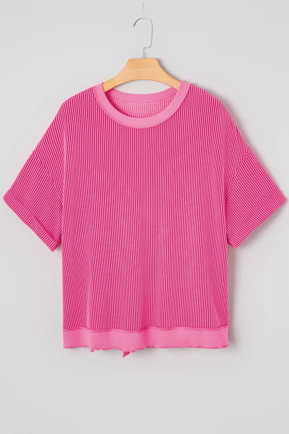 Ribbed knit short sleeve top with cutout bow-tie back