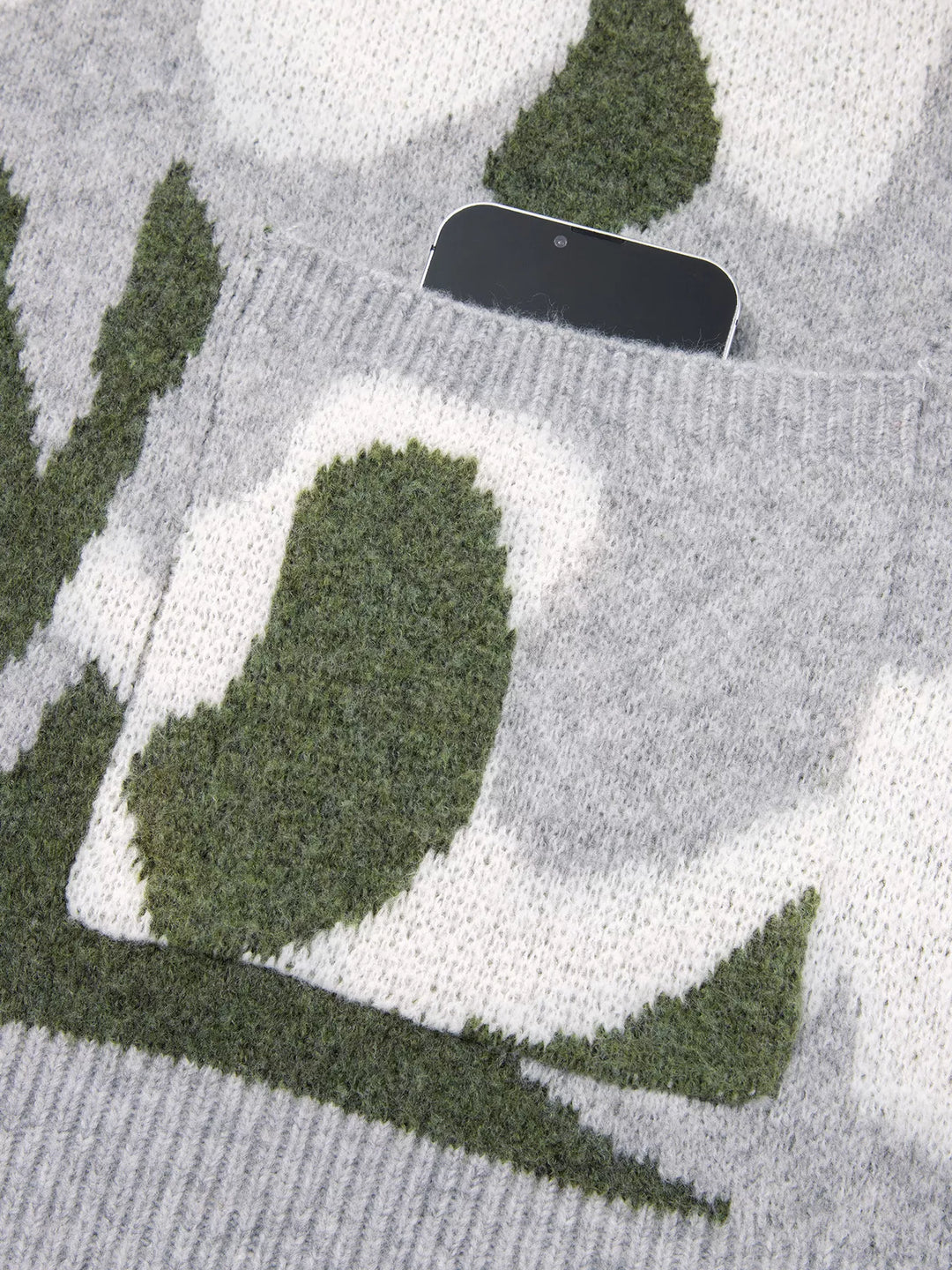 Camo knit drop shoulder cardigan with button front and pockets