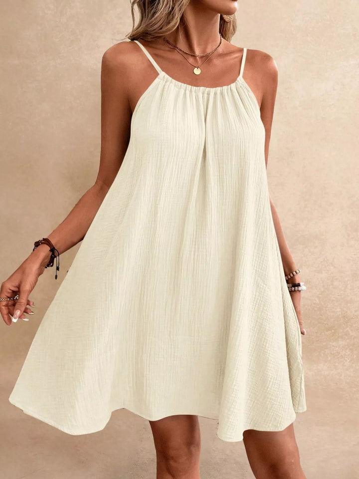 Beige Backless crinkle spaghetti strap mini dress
